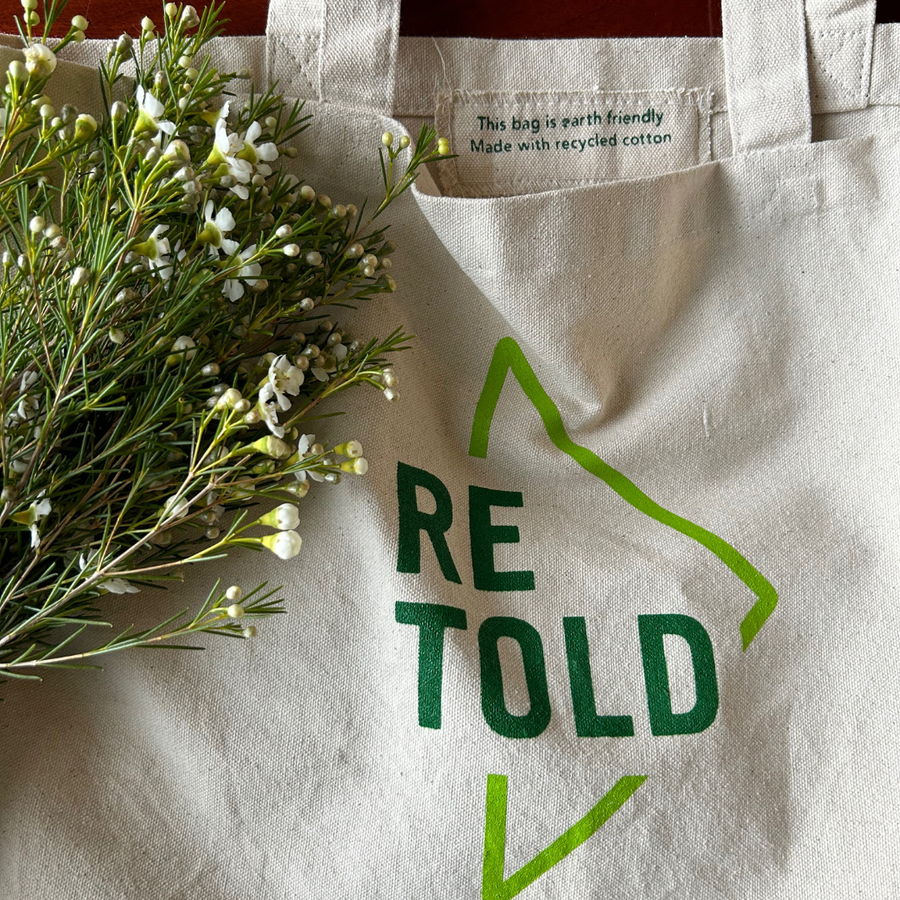 The Retold tote with wallflowers. Label inside tote reads: 
